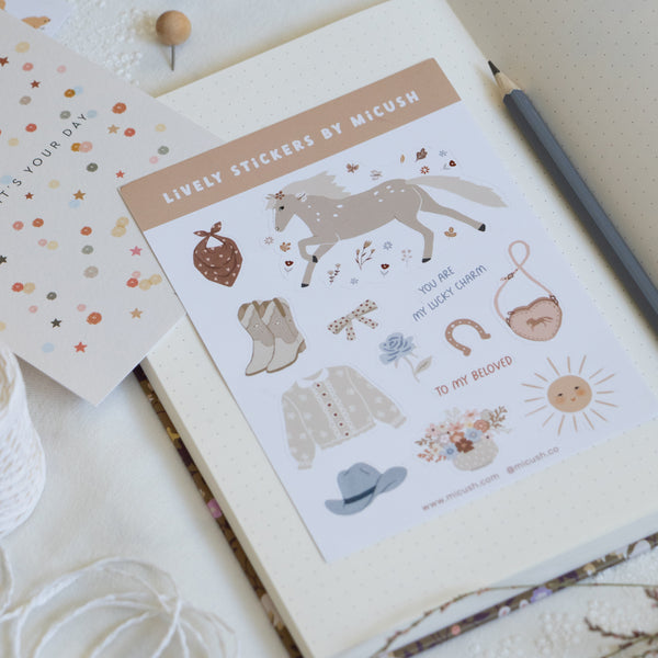 דף מדבקות - מערב פרוע ילדה