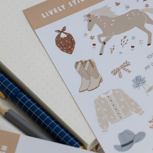 דף מדבקות - מערב פרוע ילדה